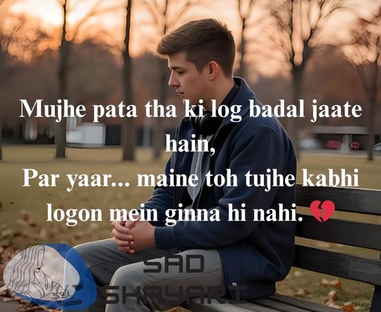 Emotional image of a boy feeling alone after realizing people change, with Shayari about badal jaate hain.